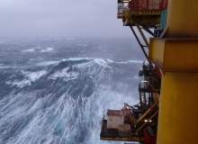 Cloak of invisibility: shielding oil rigs from rocky waves